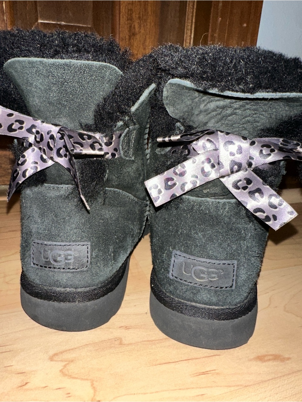 UGG Women’s Suede Bow-Back Boots in Charcoal with Leopard Bow